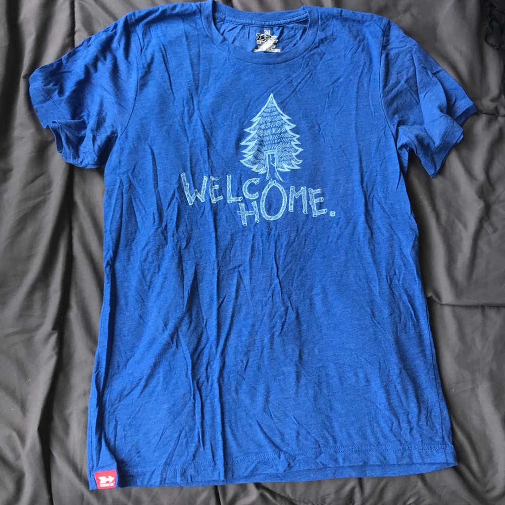 Soft blue “Welcome Home” tree tee